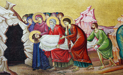 Wall mosaic of the entombment of Jesus near the Stone of anointing at Church of the Holy Sepulchre.
